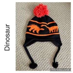 NEW DINOSAUR BEANIE EAR FLAP BRAIDED TASSEL